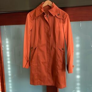 Cole Haan orange raincoat